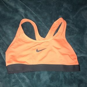 Neon orange nike sports bra